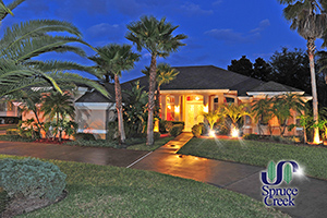 1812 Summer Green Drive | Luxury Lakefront Pool Home in Four Seasons at Spruce Creek Fly-In